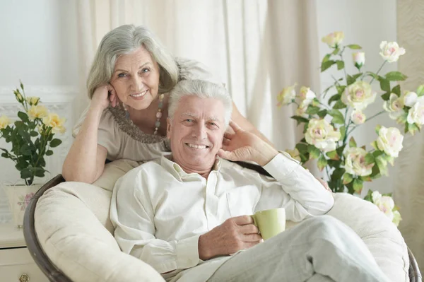 Elderly people with tea — Stock Photo, Image