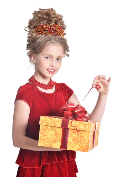 可爱的女孩在红色礼服举行礼品盒查出在白色背景 — 图库照片