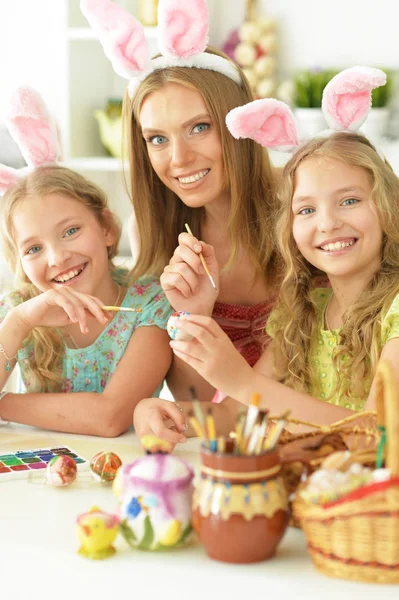 Mother Daughters Wearing Rabbit Ears Decorating Easter Eggs Home — Stock Photo, Image