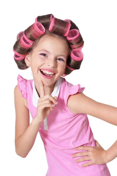 Pequena menina bonita em encrespadores de cabelo — Fotografia de Stock