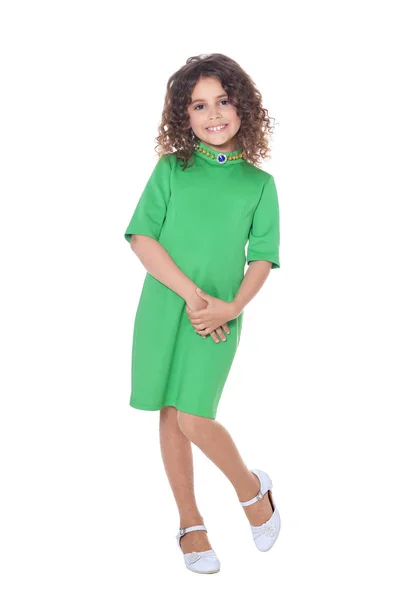 Bambina in posa in abito verde — Foto Stock