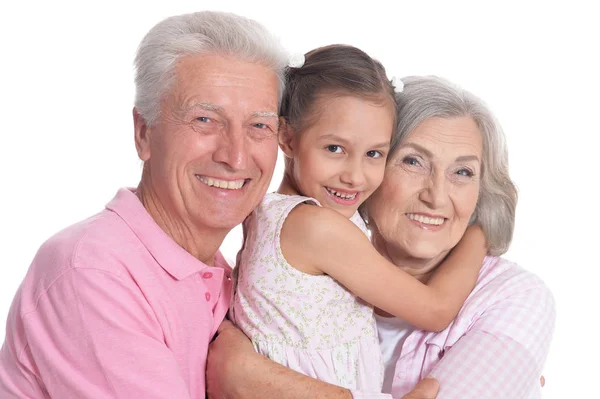 Großeltern mit Enkelin auf weiß — Stockfoto