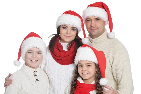 Famiglia con bambini in cappelli da Babbo Natale — Foto Stock