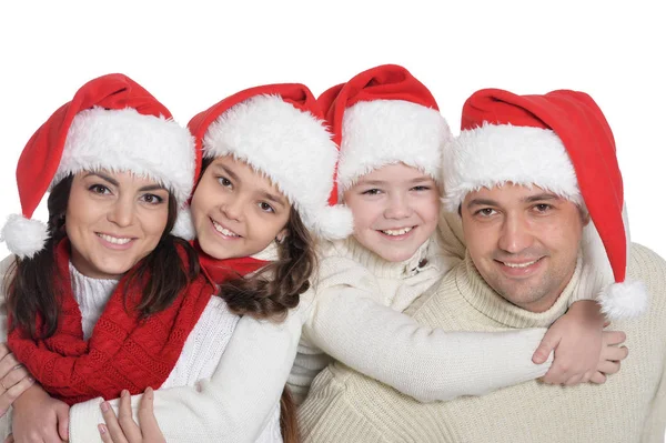 Famille avec enfants en chapeaux de Père Noël — Photo