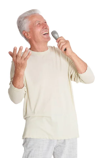 Mikrofonba énekel, magas rangú ember — Stock Fotó