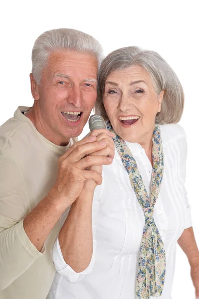 Senior couple with microphone — Stock Photo, Image