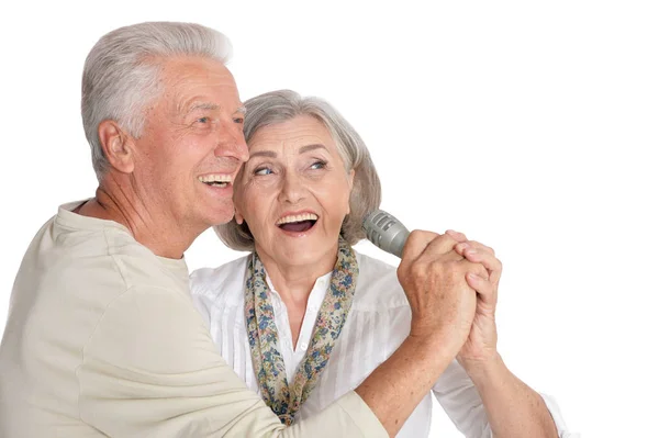 Senior couple with microphone — Stock Photo, Image