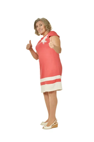 Senior woman in bright dress — Stock Photo, Image