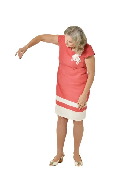 Senior woman in bright dress — Stock Photo, Image