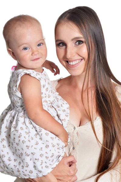 Woman with little daughter on a white — Stock Photo, Image