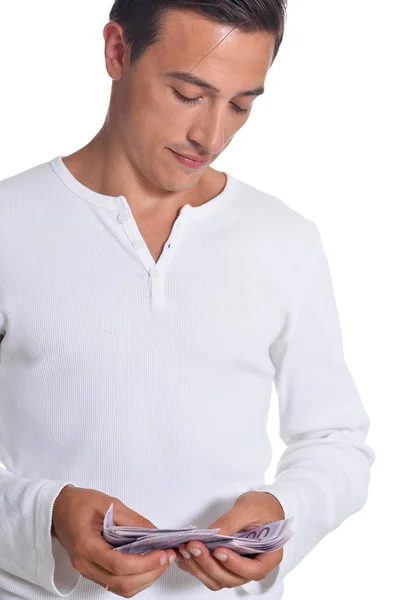 Young man holding bills — Stock Photo, Image