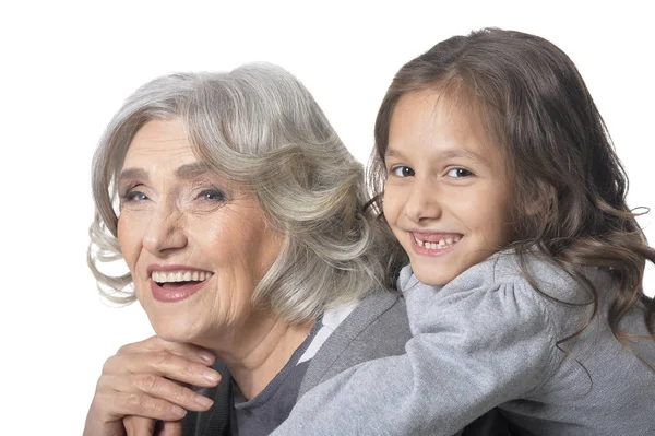 Grand Mère Étreignant Avec Petite Fille Mignonne Sur Fond Blanc — Photo