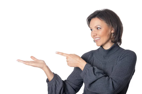 Young woman pointing on something — Stock Photo, Image