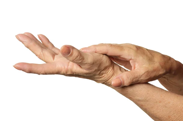 Femme appliquant de la crème sur les mains — Photo