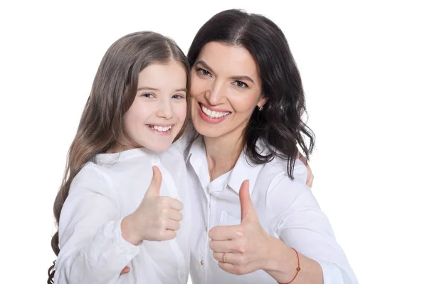 快乐的母亲和女儿在白色背景上竖起大拇指 — 图库照片