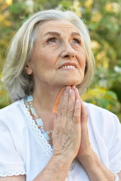 Happy Senior Beautiful Woman Spring Park Praying — Stock Photo, Image