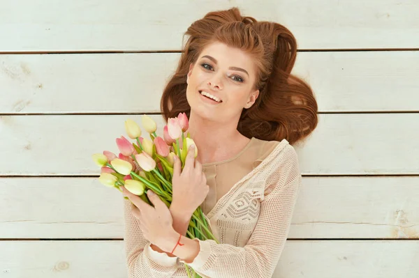 Portrait Beautiful Young Woman Tulips Lying Wooden Planks — Stock Photo, Image