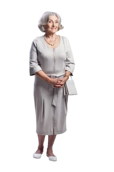 Ευτυχισμένη Ανώτερη Γυναίκα Φορώντας Ελαφρύ Φόρεμα Που Παρουσιάζουν Απομονωμένη Λευκό — Φωτογραφία Αρχείου