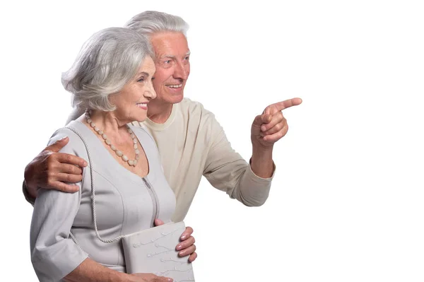 Portrait Happy Senior Couple Pointing Right White Background — Stock Photo, Image