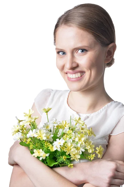白い背景に孤立したポーズの花を持つ美しい若い女性の肖像画 — ストック写真