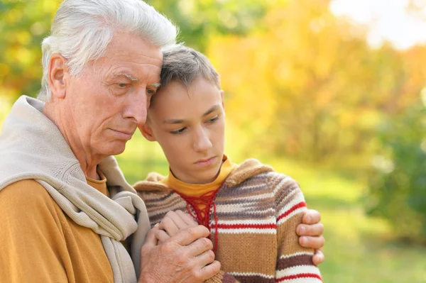 Sad Grandfather Grandson Hugging Park — Stock Photo, Image