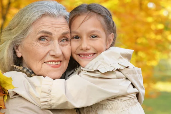 Portrait Grandmother Granddaughter Hugging Outdoors — Stock Photo, Image