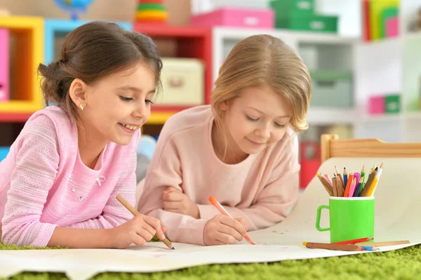 Two Cute Little Girls Drawing Pencils While Lying Floor — Stock Photo, Image