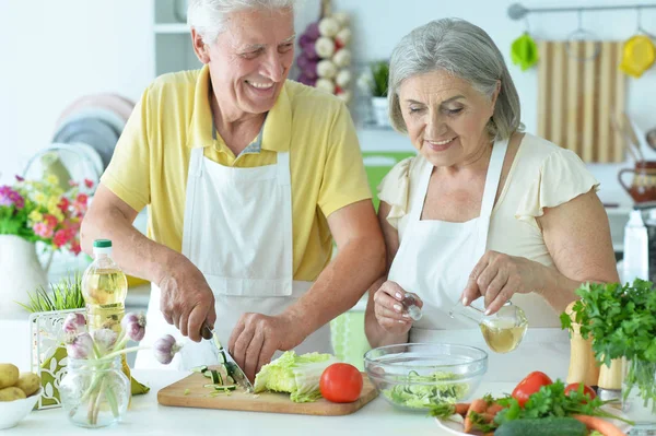 Senior Couple Cooking Together Kitchen Stock Photo