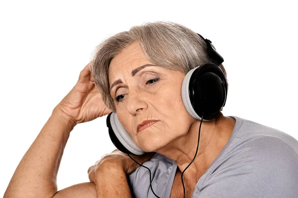 Traurige Seniorin Hört Musik Über Kopfhörer — Stockfoto