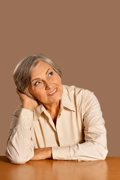 Portrait Happy Senior Woman Table — Stock Photo, Image