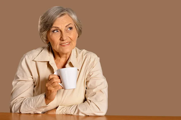 Beautiful Smiling Senior Woman Drinking Tea Home — Stock Photo, Image