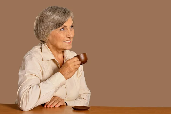 Beautiful Smiling Senior Woman Drinking Tea Home — Stock Photo, Image