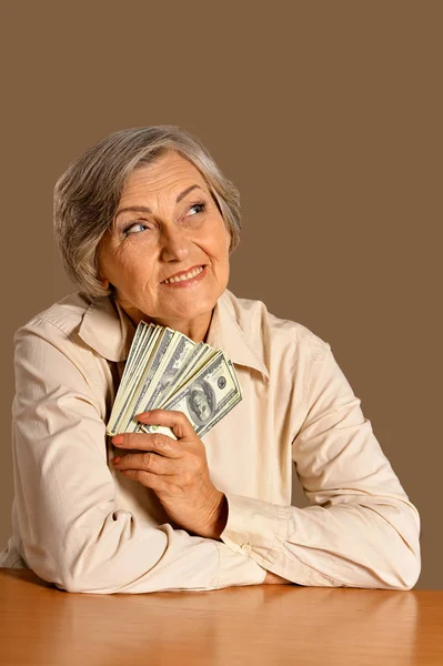 Feliz Anciana Con Dólares —  Fotos de Stock