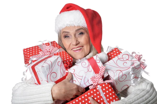 Porträt Einer Lächelnden Seniorin Mit Weihnachtsmütze Die Mit Geschenken Auf — Stockfoto