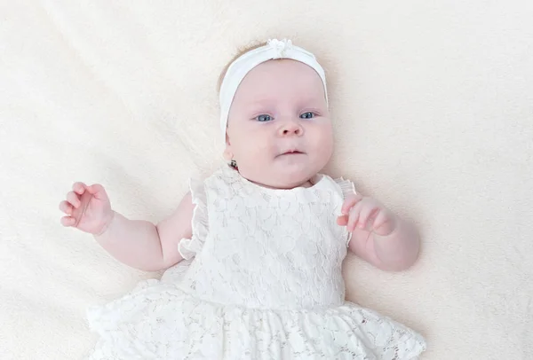 Cute Little Baby Girl White Dress Lying Bed Top View — Stock Photo, Image