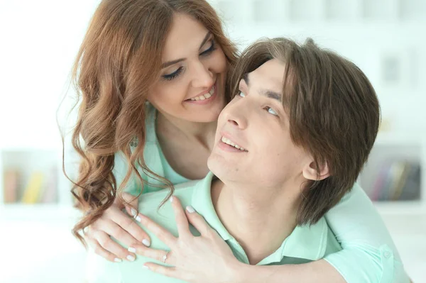 Young couple reading book — Stock Photo, Image