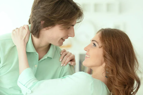 Young couple reading book — Stock Photo, Image