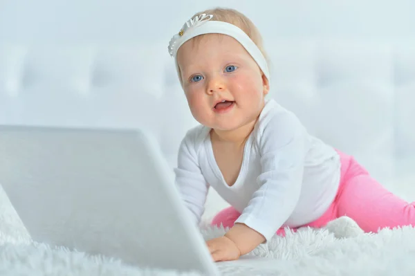 Little child playing with colorful toys Stock Picture