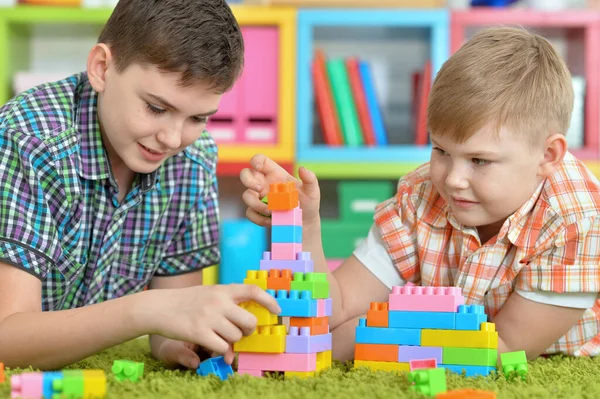 Brothers Playing Colorful Plastic Blocks Room — Stock Photo, Image