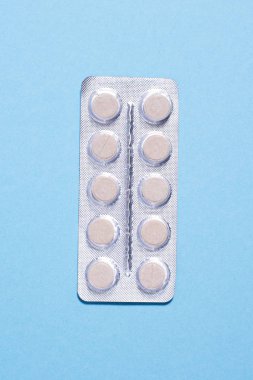 Paketleri gri yuvarlak tablet 