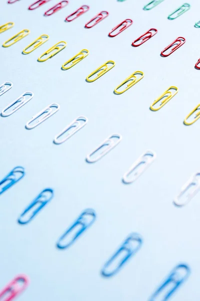 Multi-colored paper clips in row — Stock Photo, Image