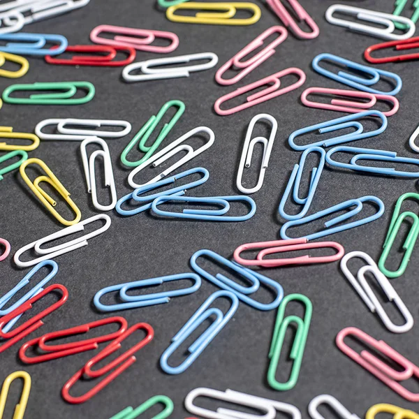Multi-colored beautiful stationery paper clips — Stock Photo, Image