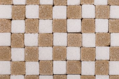 Bir dama tahtası deseninde küp şeker beyaz ve gri renklerin arka plan