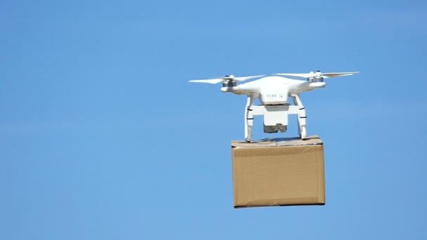 Aerial White Drone Delivers Cargo Box Field Close Slow Motion — Stock Video