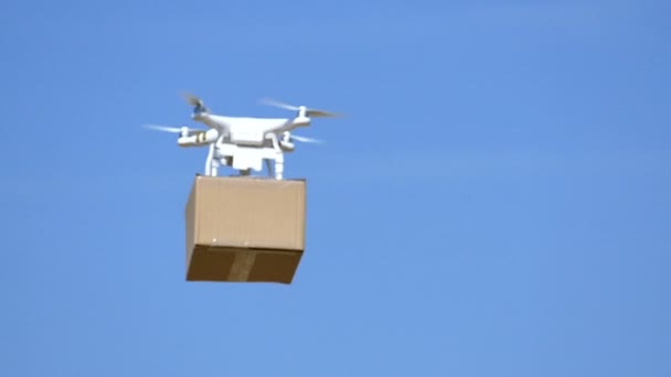 Aerial White Drone Transport Cargo Box Blue Sky Slow Motion — Stock Video