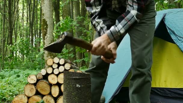 Man Chopping Wood Tent Camping Slow Motion Scene — Stock Video