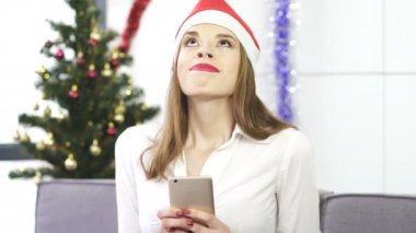 4 güzel iş kadını kırmızı Santa şapka türüne göre Santa, Hediyelik için rüyalar için smartphone