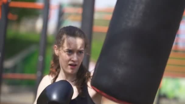 Young Woman Boxer Training Punching Bags Slow Motion Camera Movement — Stock Video