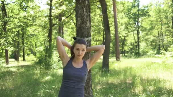 Prettyyoung Sporty Woman Doing Exercises Trx Outdoors City Park Wood — Stock Video