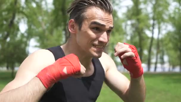 Slow Motion Young Muscular Man Boxer Does Blows Steady Shot — Stock Video